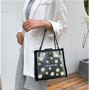Daisy print women’s black handbag!